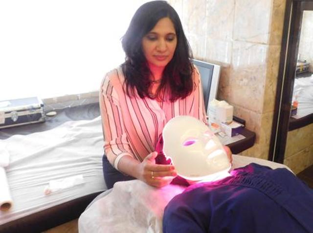 A patient undergoing LED therapy at a clinic in Mumbai.