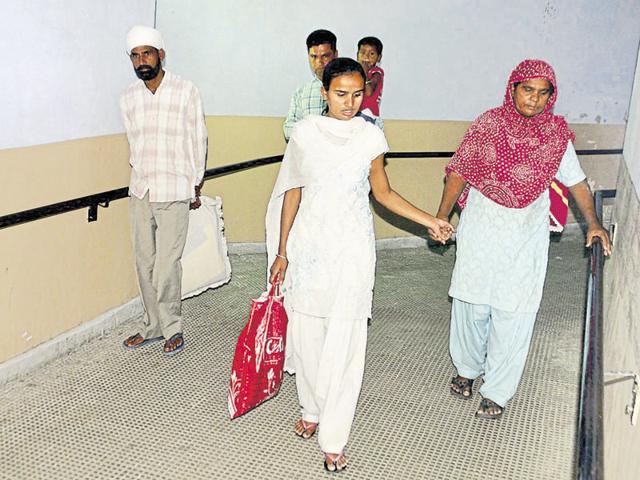 Patients forced to take the ramp in absence of functional elevators in the old building of the hospital in Amritsar. (Sameer Sehgal/HT Photo) Patients forced to take the ramp in absence of functional elevators in the old building of the hospital in Amritsar. (Sameer Sehgal/HT Photo)