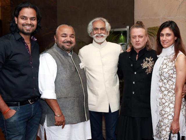 FDCI President Sunil Sethi (centre) with leading fashion designers Rohit Bal (2R), JJ Valaya (2L), Reena Dhaka (R) and Rahul Misra (L) at the Khadi fashion show. (IANS) FDCI President Sunil Sethi (centre) with leading fashion designers Rohit Bal (2R), JJ Valaya (2L), Reena Dhaka (R) and Rahul Misra (L) at the Khadi fashion show. (IANS)