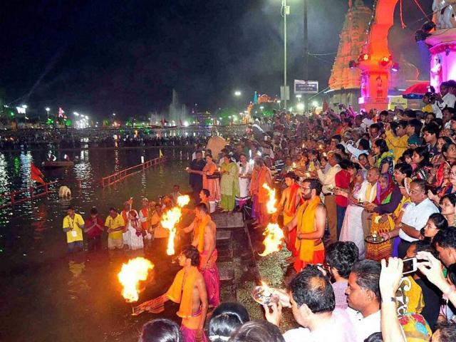 Devotees attend a aarti of holy river Kshipra during month long Simhastha Maha Kumbh Mela in Ujjain. (PTI) Devotees attend a aarti of holy river Kshipra during month long Simhastha Maha Kumbh Mela in Ujjain. (PTI)
