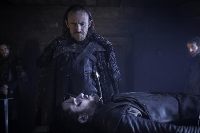 Ben Crompton, standing, and Kit Harington in a scene from the season six premiere of Game of Thrones. (AP)