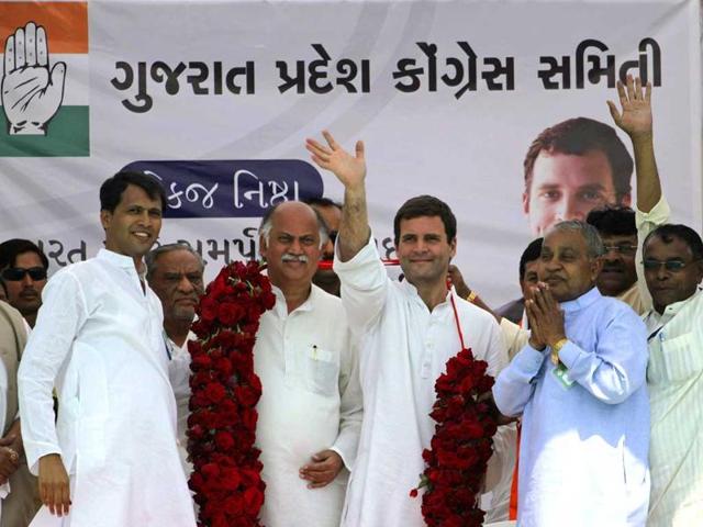 Congress party vice-president Rahul Gandhi (center), greets supporters during an election rally at Balasinor, Gujarat. (AP Photo) Congress party vice-president Rahul Gandhi (center), greets supporters during an election rally at Balasinor, Gujarat. (AP Photo)