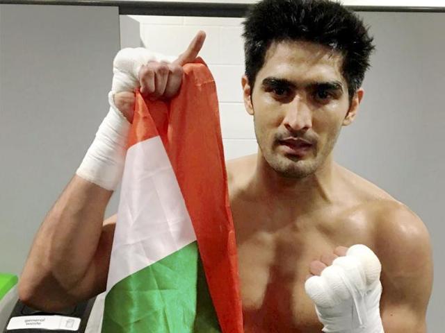 Vijender Singh celebrates win over his French opponent Matiouze Royer at Manchester Arena, England on Saturday. (PTI) Vijender Singh celebrates win over his French opponent Matiouze Royer at Manchester Arena, England on Saturday. (PTI)