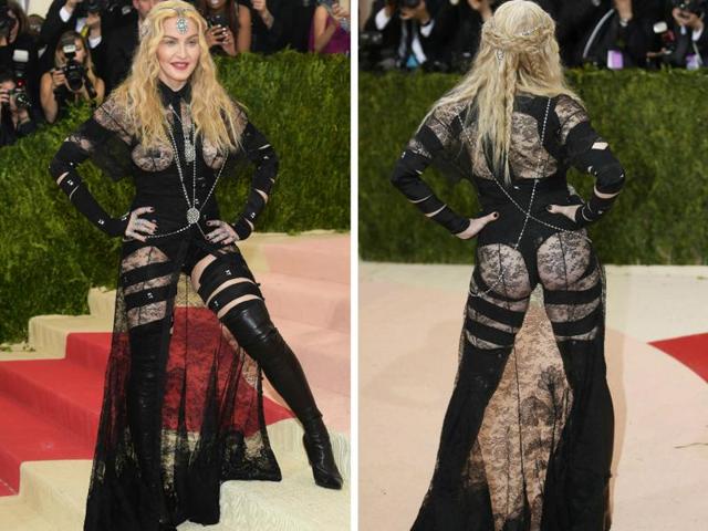 Madonna in a black Givenchy ensemble which brings only one word to mind -- bondage! Madonna in a black Givenchy ensemble which brings only one word to mind -- bondage!