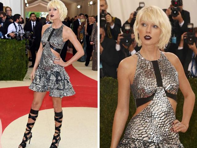 Taylor Swift went full metallic at Met Gala. The usually understated Swift ditched red lips for a cut-out silver Louis Vuitton dress with black lace-up heels. Don’t miss the vampy black lipstick. (AFP) Taylor Swift went full metallic at Met Gala. The usually understated Swift ditched red lips for a cut-out silver Louis Vuitton dress with black lace-up heels. Don’t miss the vampy black lipstick. (AFP)