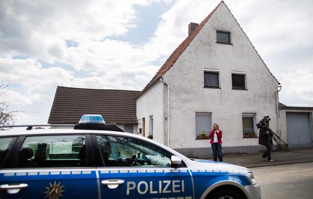 Picture taken on April 29, 2016 shows a police car standing in front of a house in Hoexter, northwestern Germany. (AFP) Picture taken on April 29, 2016 shows a police car standing in front of a house in Hoexter, northwestern Germany. (AFP)