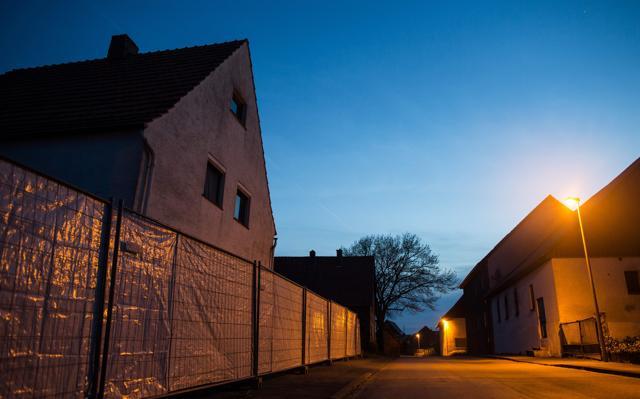 Picture taken on May 2, 2016 shows sight protection walls installed by the police in front of a house in Hoexter, northwestern Germany, where used to live a man and his ex-wife suspected of having kidnapped, abused and killed a woman. (AFP) Picture taken on May 2, 2016 shows sight protection walls installed by the police in front of a house in Hoexter, northwestern Germany, where used to live a man and his ex-wife suspected of having kidnapped, abused and killed a woman. (AFP)
