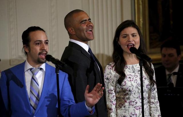 Cast members Lin-Manuel Miranda (L), Christopher Jackson (C) and Phillipa Soo perform a song from the hit musical Hamilton for US President Barack Obama and other guests at the White House in Washington March 14, 2016.