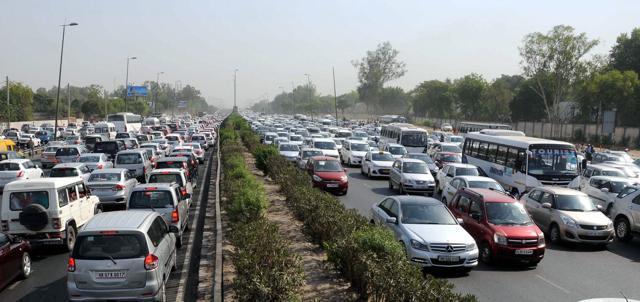 Heavy traffic jam during protest of diesel taxi drivers and owners who jammed the Delhi- Gurgaon expressway at border near Rajokri flyover in protest the ban of diesel taxi in National Capital on Monday. (PTI) Heavy traffic jam during protest of diesel taxi drivers and owners who jammed the Delhi- Gurgaon expressway at border near Rajokri flyover in protest the ban of diesel taxi in National Capital on Monday. (PTI)