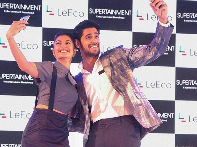 Jacqueline Fernandez with Siddharth Malhotra at a product launch event in Mumbai. (PTI)