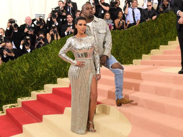 It was Balmain for Kim Kardashian and husband Kanye West as they made their appearance at The Metropolitan Museum of Art Costume Institute Benefit Gala in New York. Interesting aside: Daughter North West is in love with mommy’s dress! (Charles Sykes/Invision/AP) It was Balmain for Kim Kardashian and husband Kanye West as they made their appearance at The Metropolitan Museum of Art Costume Institute Benefit Gala in New York. Interesting aside: Daughter North West is in love with mommy’s dress! (Charles Sykes/Invision/AP)