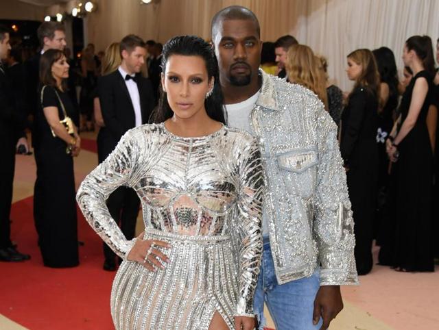 Kim Kardashian West (L) and Kanye West attend the Manus x Machina: Fashion In An Age Of Technology Costume Institute Gala at Metropolitan Museum of Art in New York . (AFP) Kim Kardashian West (L) and Kanye West attend the Manus x Machina: Fashion In An Age Of Technology Costume Institute Gala at Metropolitan Museum of Art in New York . (AFP)