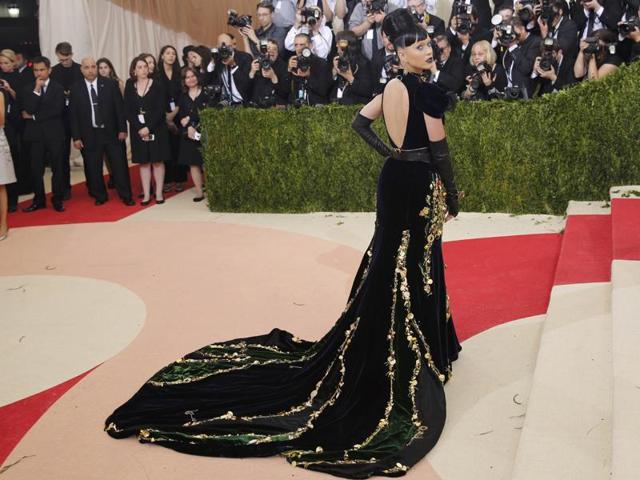 Looking at you Katy Perry, and your black velvet Prada gown with the gold embellishment that looked like it could hurt someone. (REUTERS) Looking at you Katy Perry, and your black velvet Prada gown with the gold embellishment that looked like it could hurt someone. (REUTERS)