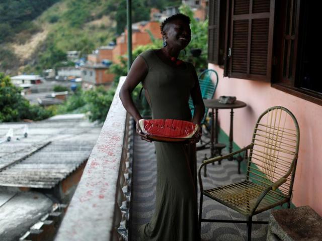 Favelas are popular for their culture and way of life with music playing an important role. Popular types of music include funk, hip-hop and Samba. (REUTERS) 