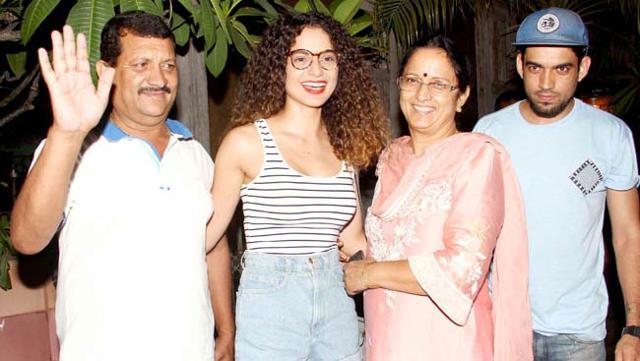 Kangana Ranaut with her parents and younger brother.