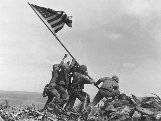 The iconic photo of American servicemen raising their national flag on top of Iwo Jima’s Mount Suribachi in 1945. (AP) The iconic photo of American servicemen raising their national flag on top of Iwo Jima’s Mount Suribachi in 1945. (AP)