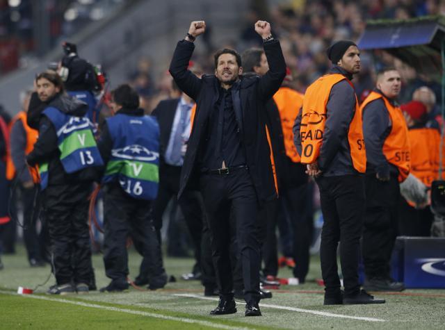 Atletico Madrid coach, Diego Simeone, celebrates after the game. (Reuters Photo)
