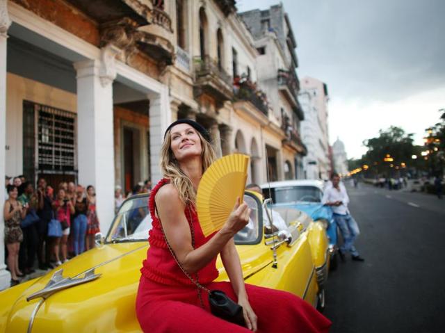 International celebrities and Cuban bigwigs graced the red carpet as Karl Lagerfeld showed his latest collection. Here, Brazilian top model Gisele Bundchen poses before the fashion show. Other high-profile attendees included Hollywood stars Vin Diesel, Tilda Swinton and Geraldine Chaplin. (REUTERS) International celebrities and Cuban bigwigs graced the red carpet as Karl Lagerfeld showed his latest collection. Here, Brazilian top model Gisele Bundchen poses before the fashion show. Other high-profile attendees included Hollywood stars Vin Diesel, Tilda Swinton and Geraldine Chaplin. (REUTERS)