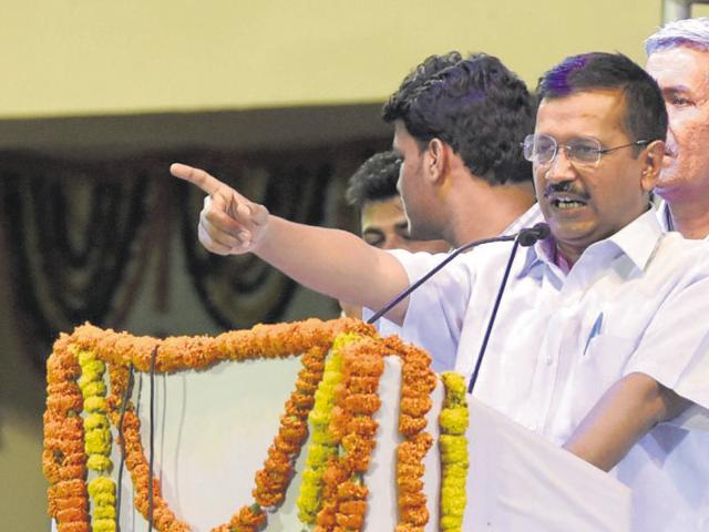 Chief minister Arvind Kejriwal addresses the volunteers during the event on Wednesday. (Mohd Zakir/HT Photo) Chief minister Arvind Kejriwal addresses the volunteers during the event on Wednesday. (Mohd Zakir/HT Photo)