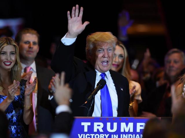 US Republican presidential candidate Donald Trump waves after speaking in New York following the primary in Indiana.(AFP)