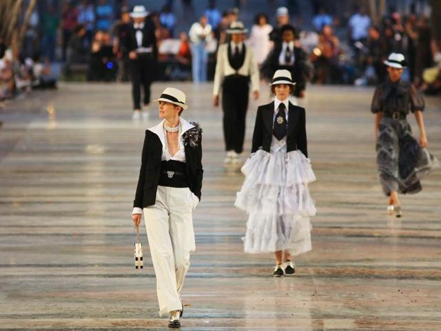 The French fashion house headed to Havana to present its Cruise 2016-2017 collection. The show took place on an open-air catwalk on the Paseo del Prado, a long seaside boulevard in a scruffy neighborhood that got a deep makeover for the occasion. (REUTERS) The French fashion house headed to Havana to present its Cruise 2016-2017 collection. The show took place on an open-air catwalk on the Paseo del Prado, a long seaside boulevard in a scruffy neighborhood that got a deep makeover for the occasion. (REUTERS)