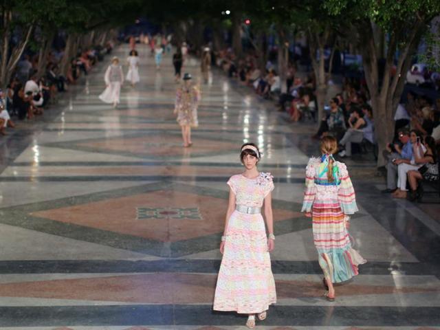 The show saw a line-up of looks brimming with vivid colors, peppered with sparkle -- sequins in particular -- and channeling a multitude of references to the island. (REUTERS) The show saw a line-up of looks brimming with vivid colors, peppered with sparkle -- sequins in particular -- and channeling a multitude of references to the island. (REUTERS)