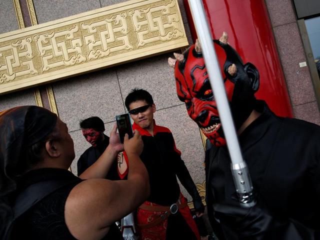 A man dressed as Darth Maul from Star Wars reacts during Star Wars Day in Taipei. (REUTERS) 