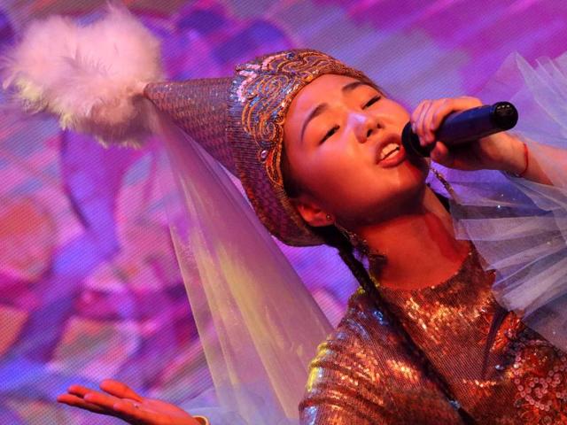 In 2015, more than 2000 students participated in the event. A student from Kyrgyzstan performs at IFLC. (AFP) 