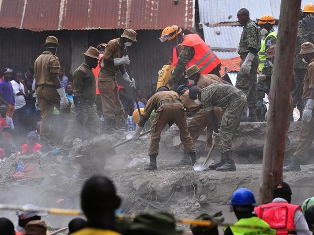 Rescue workers remove debris from the rubble of the six-storey building that collapsed killing 23 people in Nairobi's suburb of Huruma, on May 3, 2016. (AFP) Rescue workers remove debris from the rubble of the six-storey building that collapsed killing 23 people in Nairobi's suburb of Huruma, on May 3, 2016. (AFP)