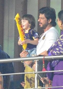 Shah Rukh Khan and his son AbRam Khan watch the IPL match between Kolkata Knight Riders and Kings XI Punjab on May 4, 2016. (IANS)