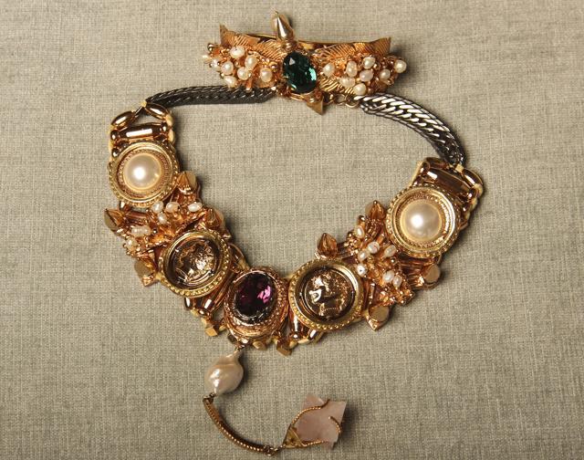 A gold neck piece from Outhouse Jewellery, embedded with pearls and other precious stones (Aalok Soni/HT) A gold neck piece from Outhouse Jewellery, embedded with pearls and other precious stones (Aalok Soni/HT)
