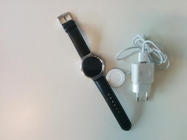 The whole kit: the Huawei Watch and its stethoscope-like charger The whole kit: the Huawei Watch and its stethoscope-like charger