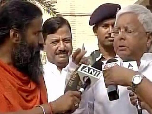 Despite being critical of each other in the past over their political ideologies, Ramdev and Lalu Prasad met in New Delhi on Wednesday showing usual camaraderie. (Twitter/ANI Photo) Despite being critical of each other in the past over their political ideologies, Ramdev and Lalu Prasad met in New Delhi on Wednesday showing usual camaraderie. (Twitter/ANI Photo)