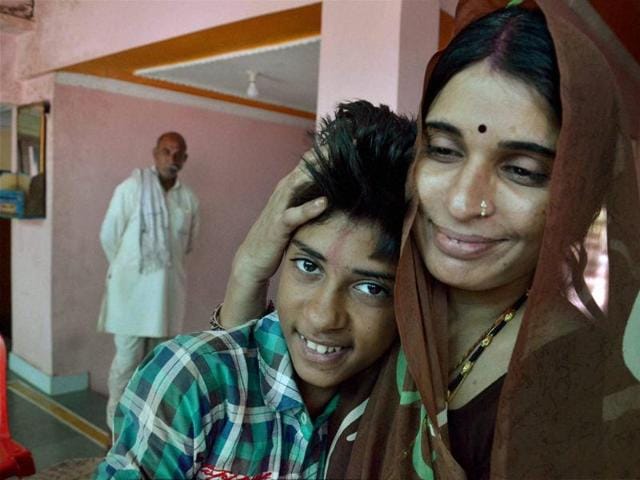 The boy reunited with his mother. The boy reunited with his mother.