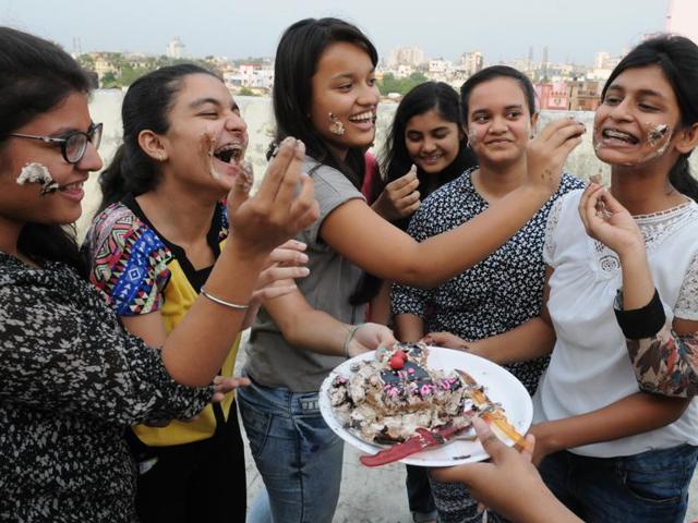 Students of St Joseph's and Carmel Convent celebrating their success after the declaration of ICSE and ISC results in Patna on Friday. (A P Dube / Hindustan Times) Students of St Joseph's and Carmel Convent celebrating their success after the declaration of ICSE and ISC results in Patna on Friday. (A P Dube / Hindustan Times)