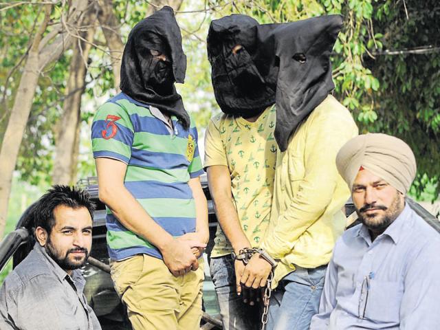 The three accused in police custody. (Bharat bhushan/HT Photo) The three accused in police custody. (Bharat bhushan/HT Photo)