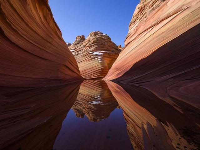 ‘The wave’ in Salt Lake City, Utah, United States: Long drive and long hike but it was truly worth to see this scenery. The shutter sound was echoing around. It was my pleasure to frame this moment. (Photo and caption by Kenji Yamamura) (National Geographic)
