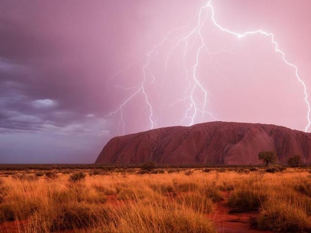 ‘Powered sight’ in Yulara, Northern Territory, Australia: I had heard a lot about how beautiful Uluru should look like when it rains. But I never believed that I would see it with my own eyes because the red center of Australia is a very arid area. That’s one of the reasons why Uluru is such a special place for the Anangu - the local aboriginal clan. If it rains, the water fills up the reservoirs around the rock, the only water source for several kilometers. This makes the Uluru Kata Tjuta National Park to special place for lots of rare animals as well. (Photo and caption by Christoph Schaarschmidt) (National Geographic)