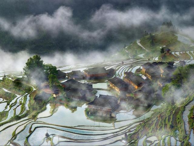 ‘Village in the mist’: Captured this image early morning waiting for one week until I get the right mood of light and fog. (Photo and caption by Thierry Bornier) (National Geographic)