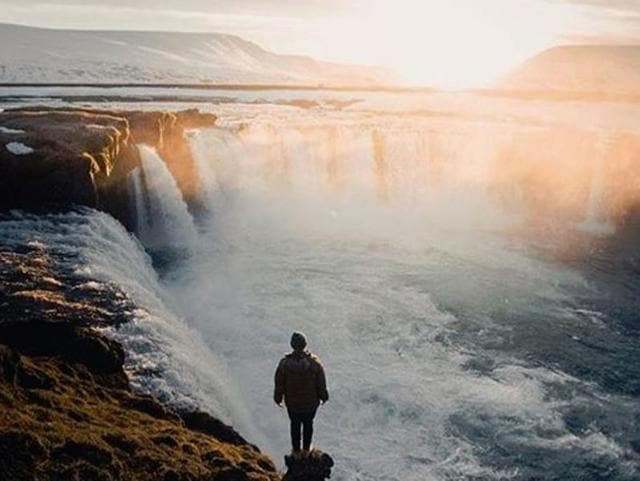 Iceland is as pretty as a dream. This guy at the Goðafoss waterfall would agree. (Instagram/backisnewfront) 