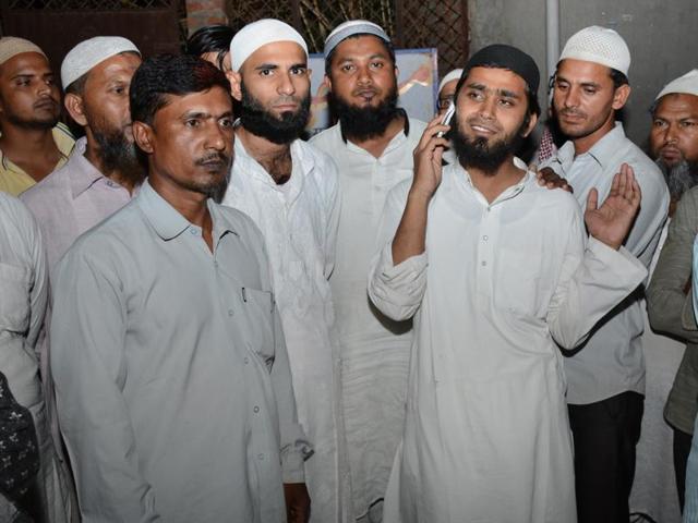 24-year-old Mohammed Muzahir (talking on phone), an Imam from Askha mosque in Loni, was freed by Delhi Police special cell after several days of detention. (Sakib Ali/Hindustan Times) 24-year-old Mohammed Muzahir (talking on phone), an Imam from Askha mosque in Loni, was freed by Delhi Police special cell after several days of detention. (Sakib Ali/Hindustan Times)