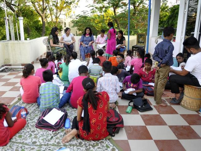 After her mother and father passed away, Chaturvedi wanted to continue their legacy and their vision to help out the economically weaker sections of society. She, along with her two daughters Swati (26) and Sukriti (25), have been holding this evening school for the past year on the terrace of their apartment. (Sunil Ghosh/ HT Photo) After her mother and father passed away, Chaturvedi wanted to continue their legacy and their vision to help out the economically weaker sections of society. She, along with her two daughters Swati (26) and Sukriti (25), have been holding this evening school for the past year on the terrace of their apartment. (Sunil Ghosh/ HT Photo)