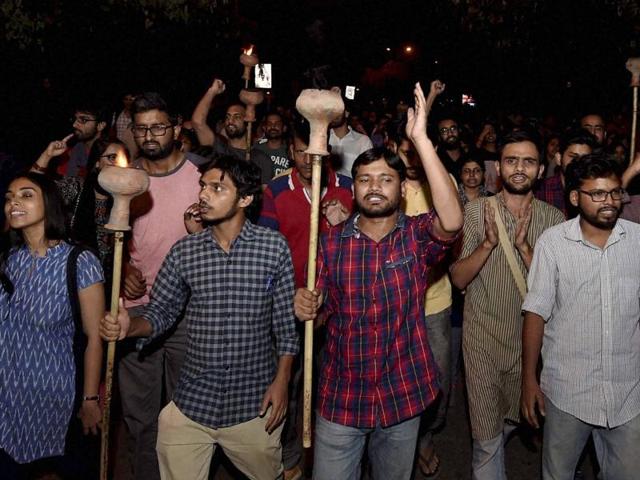 JNUSU president Kanhaiya Kumar with Umar Khalid and other students during a parade at the JNU campus in New Delhi.. (PTI Photo) JNUSU president Kanhaiya Kumar with Umar Khalid and other students during a parade at the JNU campus in New Delhi.. (PTI Photo)