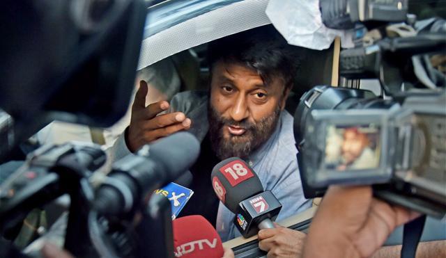 Film director Vivek Agnihotri interacts with the media after his car was stopped by the students at the entrance of Jadavpur University campus. (PTI) Film director Vivek Agnihotri interacts with the media after his car was stopped by the students at the entrance of Jadavpur University campus. (PTI)