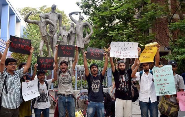 Jadavpur University Students hold posters and demonstrating against film director Vivek Agnihotri. (PTI) Jadavpur University Students hold posters and demonstrating against film director Vivek Agnihotri. (PTI)