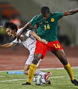 In this Sept 26, 2009 photo, Cameroon's Patrick Ekeng, right, challenges Korea's Oh Jae Suk during their U-20 World Cup group C soccer match at the Suez Mubarak Stadium in Suez, Egypt. (AP file picture ) In this Sept 26, 2009 photo, Cameroon's Patrick Ekeng, right, challenges Korea's Oh Jae Suk during their U-20 World Cup group C soccer match at the Suez Mubarak Stadium in Suez, Egypt. (AP file picture )
