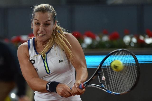 Dominika Cibulkova returns serve. (AFP) Dominika Cibulkova returns serve. (AFP)