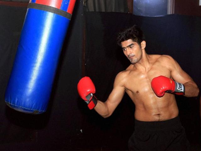 Boxer Vijender Singh practices before his next professional boxing bout against Matiouze Royer at Manchester Arena. (PTI) Boxer Vijender Singh practices before his next professional boxing bout against Matiouze Royer at Manchester Arena. (PTI)