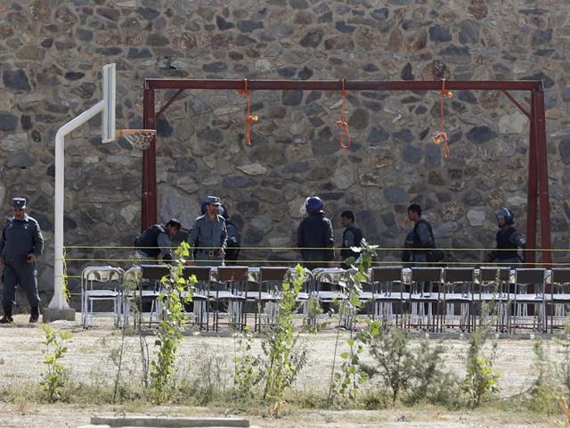 Police officers take positions by nooses as they prepare to execute men at a jail in Kabul, Afghanistan. (AP File Photo) Police officers take positions by nooses as they prepare to execute men at a jail in Kabul, Afghanistan. (AP File Photo)
