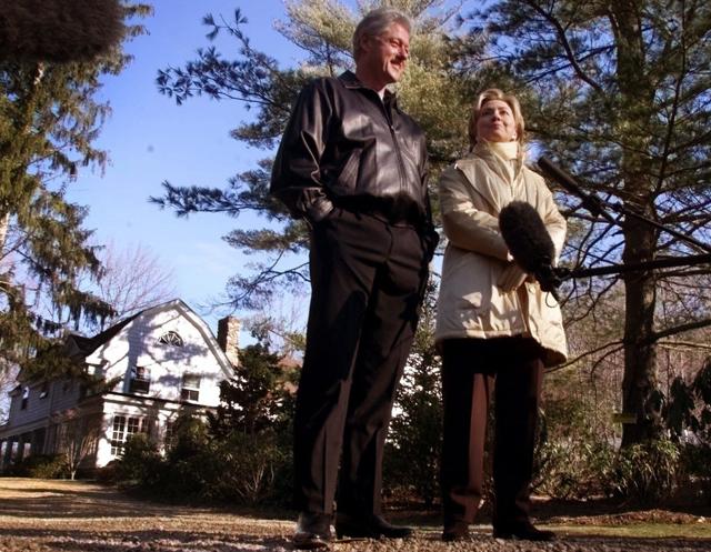 In this January 6, 2000 file photo, Bill and Hillary Clinton stand in the driveway of their new home in Chappaqua. (AP) In this January 6, 2000 file photo, Bill and Hillary Clinton stand in the driveway of their new home in Chappaqua. (AP)